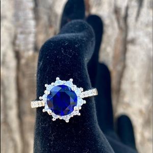 Silver Tone Ring with a Blue Stone